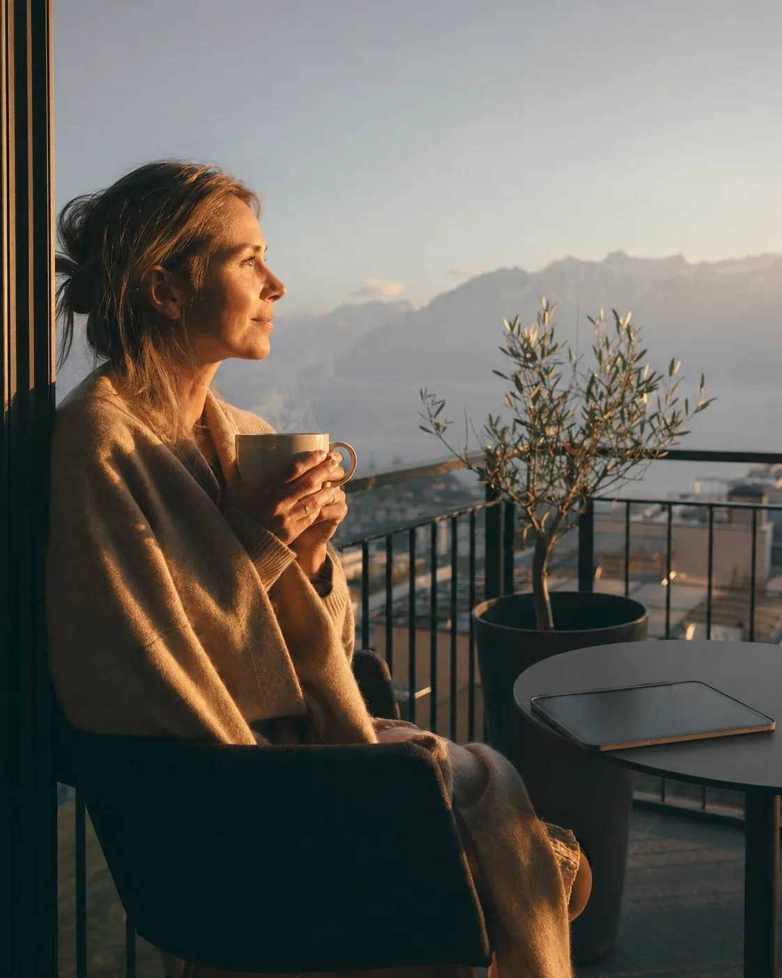 Balcon sur le Léman au matin, suivi de portefeuille sur smartphone